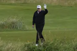 Trump plays golf in Scotland while protesters take to the streets and decry his visit